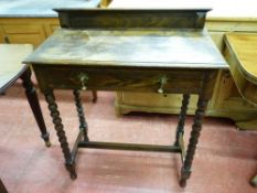 A VINTAGE OAK SINGLE DRAWER HALL TABLE with railback top and brass drop drawer handles on bobbin