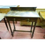 A VINTAGE OAK SINGLE DRAWER HALL TABLE with railback top and brass drop drawer handles on bobbin