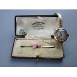 A NINE CARAT GOLD CASED LADY'S WATCH and a Victorian stickpin, the watch with expanding metal