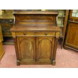 A VICTORIAN MAHOGANY CHIFFONIER with top shelf section on carved corbel supports, single frieze