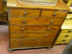 A LARGE LATE VICTORIAN MAHOGANY CHEST of two short over four long drawers with turned wooden knobs