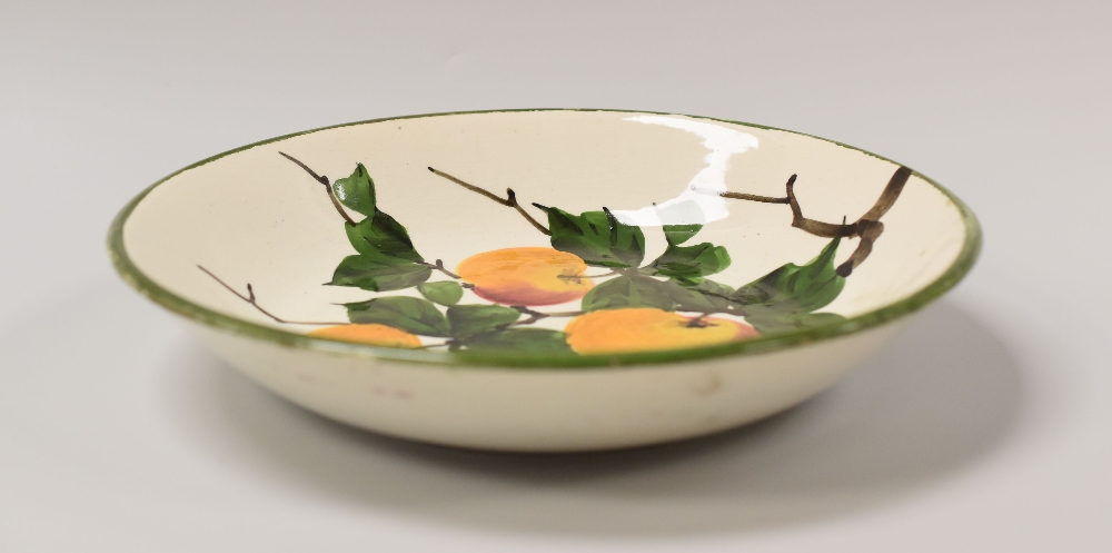 A SHALLOW LLANELLY POTTERY APPLE DISH with three painted fruit in branches with leaves, LLANELLY - Image 3 of 3