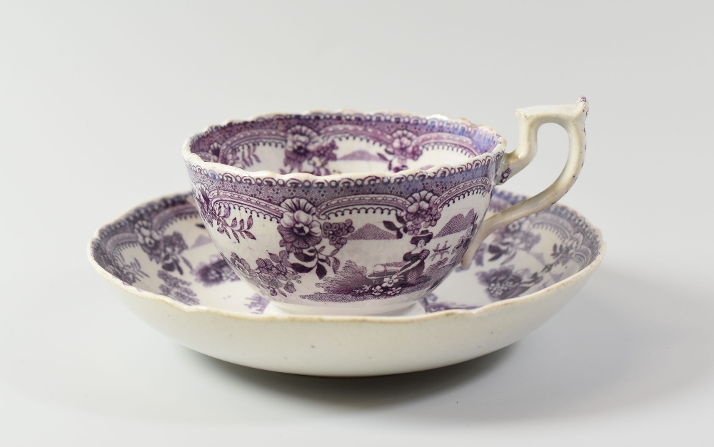 A SWANSEA CAMBRIAN POTTERY CUP & SAUCER circa 1824-1831 in the puce 'Ne Plus Ultra' pattern with - Image 2 of 2