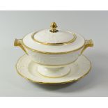 A SWANSEA PORCELAIN GILDED TUREEN, COVER & STAND, the tureen of circular pedestal form with