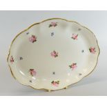 A SWANSEA PORCELAIN OVAL DISH of lobed and footed form with gilded edge and painted with a series of
