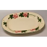 A LARGE LLANELLY POTTERY HYBRID TEA-ROSE PLATTER the border with stems of open and closed roses