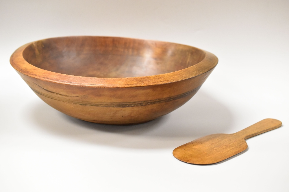 A WELSH SYCAMORE TREEN DAIRY BOWL, 43cms diam together with a simple undecorated butter pat, 30cms - Image 2 of 2