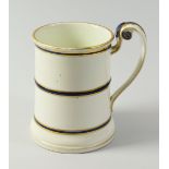 A RARE SWANSEA PORCELAIN TANKARD (smaller version) of slightly tapered form with everted rim, the