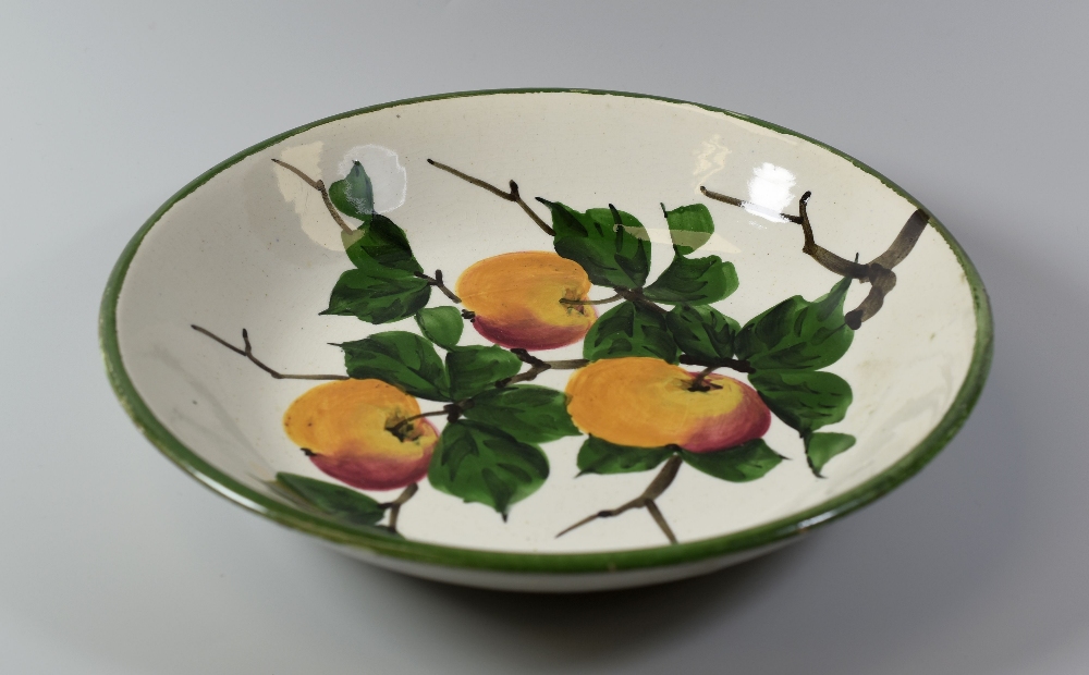 A SHALLOW LLANELLY POTTERY APPLE DISH with three painted fruit in branches with leaves, LLANELLY - Image 2 of 3