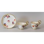 A NANTGARW PORCELAIN TRIO circa 1820, with gilded loop handles, gilt dentil rims and finely