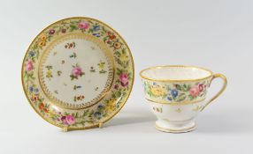 A RARE NANTGARW PORCELAIN BREAKFAST CUP & SAUCER having a dentil gilt rim and a continuous chain