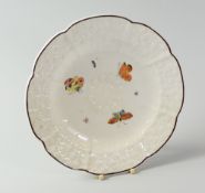 A RARE EARLY PRODUCTION NANTGARW PORCELAIN DAISY MOULDED PLATE the moulding to the border and