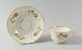 A SWANSEA PORCELAIN CUP & SAUCER with floral sprays and gilding, black Swansea script mark (wear)