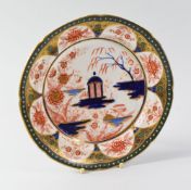 A SWANSEA PORCELAIN GAZEBO PATTERN PLATE, 1817-1820 decorated in the Japan style with interior