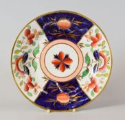 A SWANSEA PORCELAIN 'JAPAN' DESSERT PLATE having a wide border decorated in four alternate