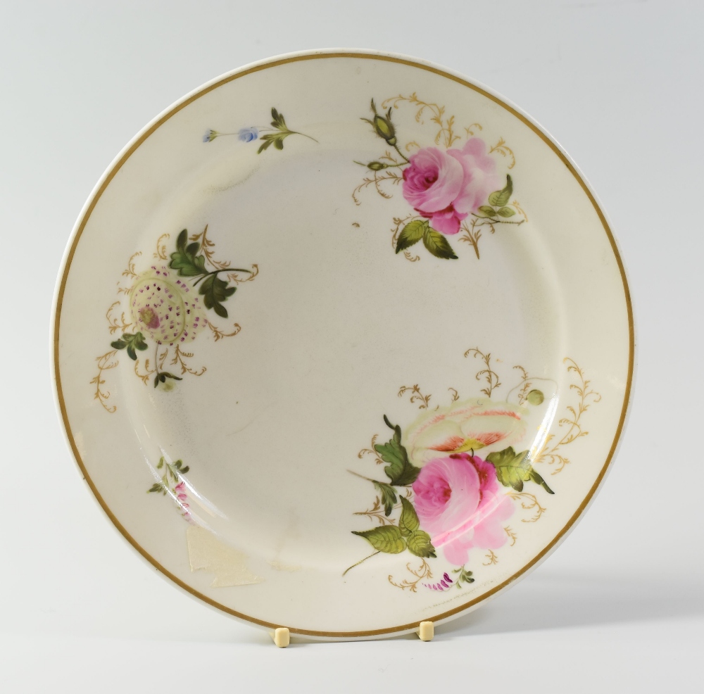 A SWANSEA PORCELAIN PLATE circa 1817, painted with three sprays of roses and other flowers and two