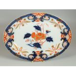 A SWANSEA PLATTER, CIRCA 1806, of oval shape, painted in the centre in underglaze blue and iron-