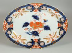 A SWANSEA PLATTER, CIRCA 1806, of oval shape, painted in the centre in underglaze blue and iron-