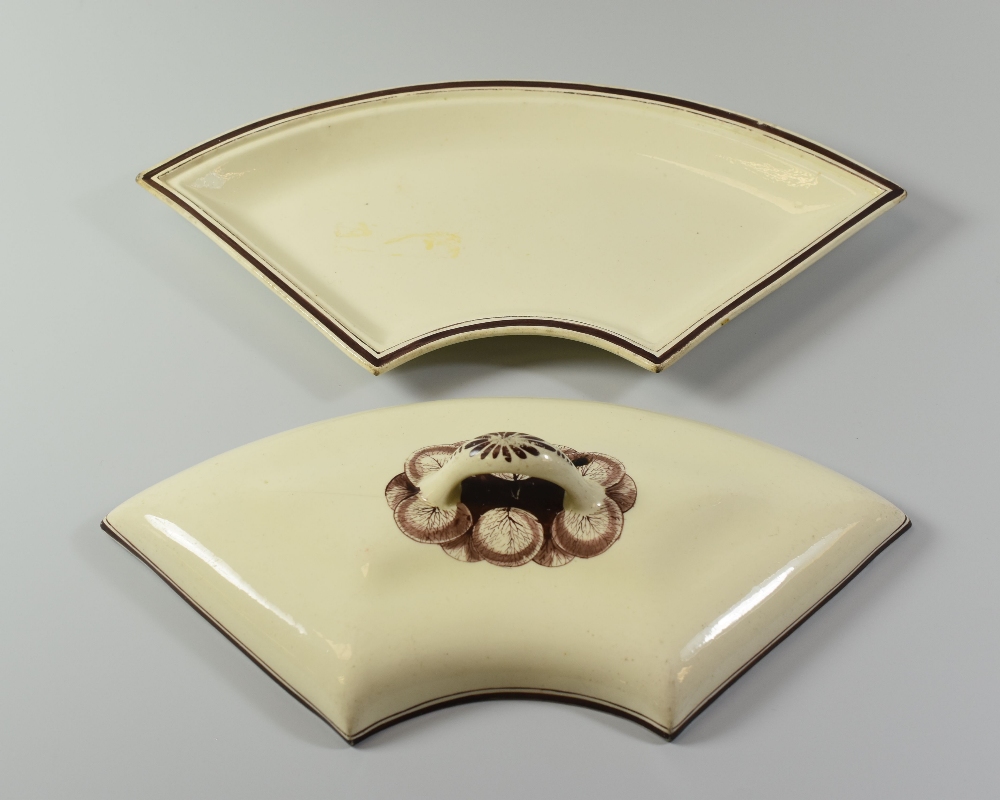 A SWANSEA CREAMWARE SUPPER-SET PART circa 1805, of curved form with loop handle and with painted - Image 2 of 4