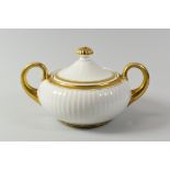 A SWANSEA PORCELAIN GILDED SUCRIER & COVER with Paris Flute moulding, exaggerated loop handles of