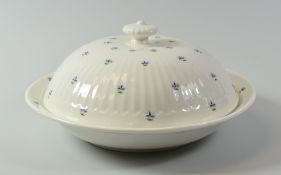 A SWANSEA PORCELAIN MUFFIN DISH with circular flared base, the cover with convex Paris Flute