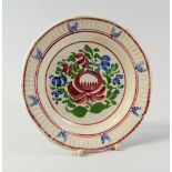 A SWANSEA POTTERY CHILD'S PLATE, Baker, Bevans & Irwin period, the border with continuous moulded