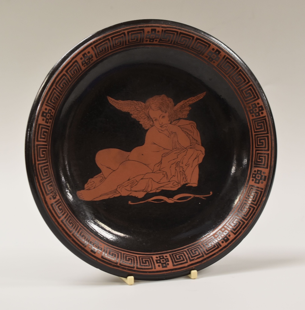 A RARE DILLWYN'S ETRUSCAN PATERA of circular form in red earthenware, decorated in black with an