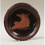 A RARE DILLWYN'S ETRUSCAN PATERA of circular form in red earthenware, decorated in black with an