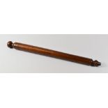A FRUITWOOD TREEN SCROLL-WINDER from a South East Wales family, 42cms long