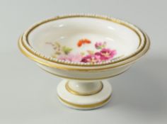 A RARE NANTGARW PORCELAIN MINIATURE TAZZA, circa 1820, the bowl of shallow circular form raised over