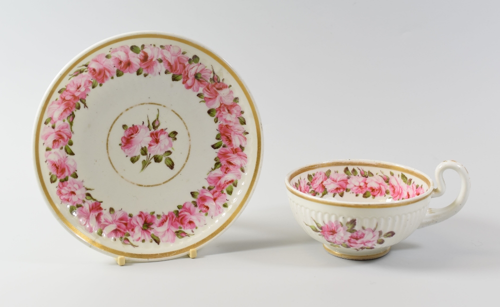 A SWANSEA PORCELAIN BREAKFAST CUP & SAUCER with Paris Flute moulding and painted with a continuous