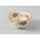 A SWANSEA PORCELAIN TEA-BOWL with flared rim and flanged foot, painted with floral sprays and