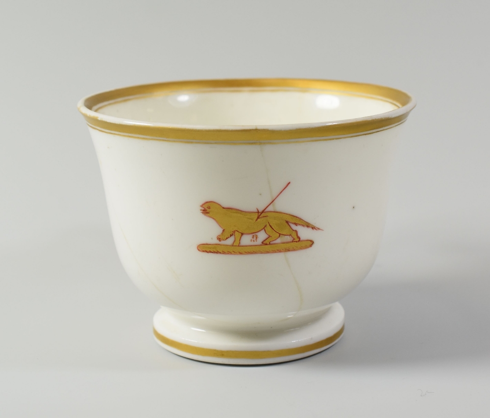 A NANTGARW PORCELAIN CRESTED BREAKFAST CUP, circa 1818-20 with an emblem of speared otter in gold