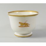 A NANTGARW PORCELAIN CRESTED BREAKFAST CUP, circa 1818-20 with an emblem of speared otter in gold