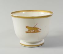 A NANTGARW PORCELAIN CRESTED BREAKFAST CUP, circa 1818-20 with an emblem of speared otter in gold