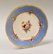 A NANTGARW PORCELAIN PLATE WITH SIX FLORAL SPRAYS of alternate lobed form, finely decorated with a