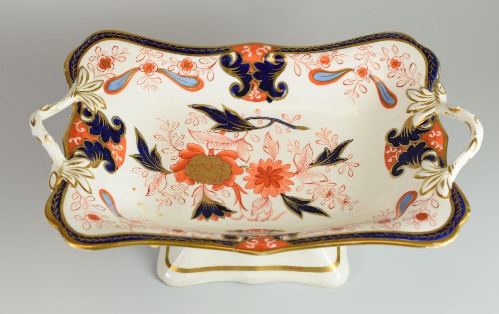 A SWANSEA PORCELAIN CENTRE DISH COMPORT circa 1815-17 raised on a shaped rectangular base and with
