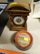 A wooden encased mantel clock and a good Guinness advertising dish