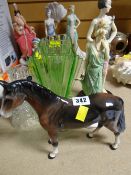 A Beswick standing brown horse, two collector's figurines, a pair of Deco-style green glass vases