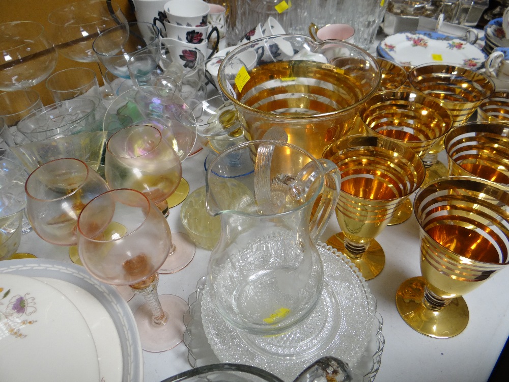 A gold banded punch drinking set with jug and a quantity of mixed glassware including sundae