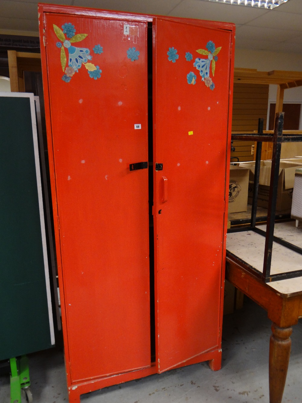 A painted pine two-door cupboard and a pine chest of drawers