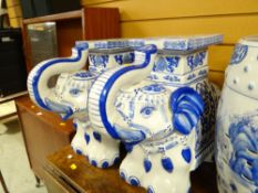 A pair of reproduction Oriental pottery elephant stools