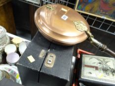 A copper bed warming pan and a quantity of gramophone records