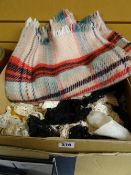 A box of lace, a tartan blanket etc