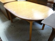 An oval extending dining table