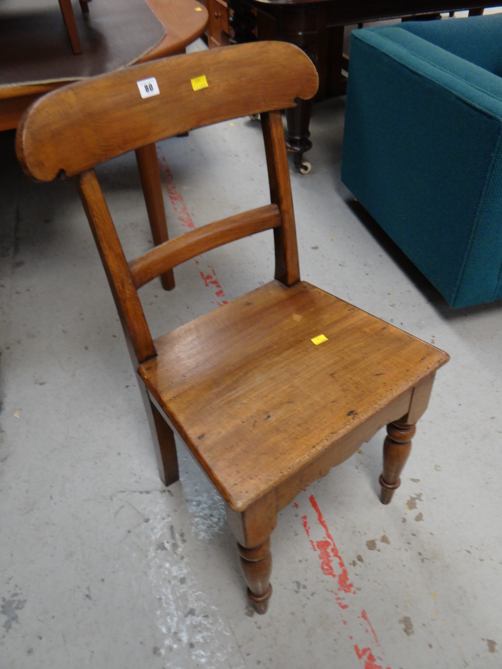 A stained antique farmhouse chair