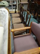 Three good antique farmhouse chairs, a modern armchair and a pair of earlier chairs