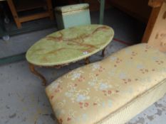 An onyx topped table and two vintage loom ottomans