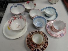 A collection of antique tea bowls etc