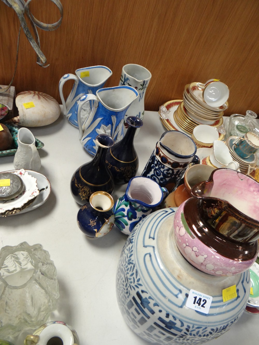 An Oriental blue & white pottery provision jar, a sponge ware jug, copper lustre, two blue & white